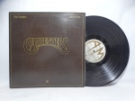 Disco de Vinil LP - `The Singles 1969-1973`, com Carpenters, em bom estado.