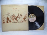 Disco de Vinil LP - `A Trick of the Tail`, com Genesis, em bom estado. Inclui encarte.