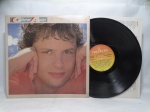 Disco de Vinil LP - `Calor`, com Guilherme Arantes, em bom estado. Inclui encarte.