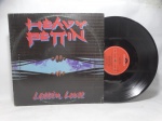 Disco de Vinil LP - `Lettin` Loose`, com Heavy Pettin`, em bom estado.
Inclui encarte.