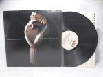 Disco de Vinil LP - `Peace and Love, Inc.`, com Information Society, em bom estado. Inclui encarte.