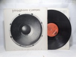 Disco de Vinil LP Importado - `In Your Face`, com Kingdom Come, em bom estado. Inclui encarte.
