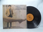 Disco de Vinil LP - `A Primeira Noite de Um Homem`, com Simon & Garfunkel, em bom estado.