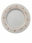 VARIG - Prato de coleção em porcelana NORITAKE, Japão, com decoração floral estilizada em dourado, filetes em ouro e marca VARIG NORITAKE JAPAN ao verso. Peça de serviço da VARIG, período meados do século XX. Discreto bicado verso.Diâmetro: 16 cm