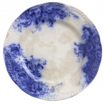 PORTUGAL - Antigo prato raso em faiança portuguesa da FÁBRICA DE LOUÇA DE SACAVÉM, motivo TOGO, com decoração floral estampilhada em azul borrão sobre fundo branco, aba recortada e rico padrão ornamental de guirlandas.. Marca GILMAN & Cia.  SACAVÉM  PORTUGAL, período virada do século. Sinais de uso e manchas do tempo. Mede 25 cm diâmetro.
