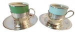Lote com duas xícaras para café em metal espessurado em a prata com porcelana na tonalidade azul e verde. Medida: Altura 5 cm E Diâmetro 5 cm.
