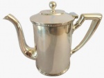 PRATA WOLFF- Bule em metal espessurado a prata com borda trabalhada. Medida: Altura 20 cm, Largura 10 cm e Comprimento 22 cm.