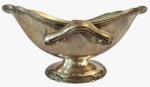 PRATA WOLFF- Moleira em metal espessurado a prata com borda e pegador trabalhado. Medidas: Altura 10 cm, Largura 15 cm e Comprimento 19 cm. 