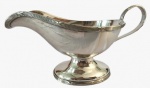PRATA WOLFF- Moleira em metal espessurado a prata com borda trabalhada. Medidas: Altura 10 cm, Largura 9 cm e Comprimento 20 cm. 