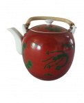 Bule em porcelana pintada artesanalmente na tonalidade verde e vermelha. Medidas: Altura 14 cm e Diâmetro 12 cm. 