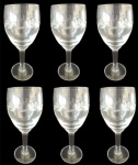 Lote com 6 taças em cristal  para vinho do porto com lapidação em baixo relevo em tema de folhas . Medida: altura 15 cm diâmetro 6 cm. 