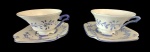 Par de xicaras em porcelana para café pintada artesanalmente em tema floral. Medida: altura 5 cm diâmetro 8 cm.