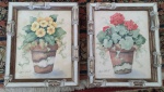 Par de quadros decorativos em tema de flores. Medida: 30x24 cm.