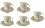 Lote com cinco xícaras para café em porcelana com tema floral. Medida: altura 6 cm diâmetro 6 cm.