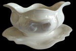 PORCELANA MAUÁ - Moleira em porcelana na tonalidade branca. Medida: altura 12 cm largura 18 cm comprimento 22 cm.