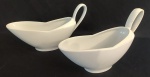 REAL- Par de moleiras em porcelana branca. Medida: altura 13 cm largura 8 cm comprimento 23 cm. 