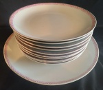 Conjunto para bolo com onze peças sendo dez pratinhos para sobremesa e um prato para bolo. Medida maior: diâmetro 26 cm.