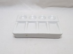 Godê com 8 cavidades em porcelana branca. Medindo 15,5cm x 10,5cm x 3,5cm de altura.