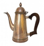 WOLFF - Antigo bule, confeccionado em metal espessurado a prata  marcada, alça em madeira e a pega na forma de pinha; Medindo 21 x 19,5 cm