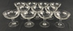Conjunto de 11 taças para champanhe/ sobremesa em cristal europeu translúcido, com bojos decorados por folhas de parreira fosqueadas, cachos de uvas gravados e delicadas linhas onduladas. Hastes moldadas e bases circulares.  Medidas: 9 x 10 cm.