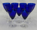 HERING. Conjunto de 9 taças em cristal, com bojo em azul cobalto, hastes translúcidas facetadas e bases circulares. Medidas: 16 x 7,5 cm ( 6 delas) e 13,5 x  6,5 cm. (3 delas).