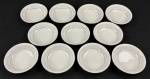 NORITAKE, Japão. Onze tigelas em porcelana japonesa modelo Buckinham, na cor branca com elegantes frisos prateados e desenhos florais leitosos. Medindo: 3 x 14 cm.
