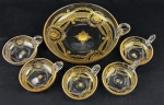 EUROPA - Conjunto vintage para sobremesa em cristal translucido, lapidado e com rica decoração em ouro, composto de saladeira e cinco tigelas. Medindo: 4 x 24 cm e 3 x 10 cm.
