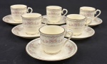 Noritake, Bone China, Japan. Seis xícaras para café em porcelana japonesa, esmaltada e policromada com motivos florais e filetes em ouro. Manufatura no verso.