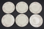 Noritake, Bone China, Japan. Seis pratos para pão em porcelana japonesa, esmaltada e policromada com motivos florais e filetes em ouro. Manufatura no verso. Medindo: 16,5 cm.