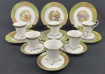 Seis trios para chá e bolo em porcelana branca, ricamente decorado com cena galante policromada, faixa verde e detalhes dourados. Composto de: 6 xícaras de chá e 6 pratos de sobremesa. Prato mede: 20cm.