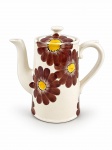 WEISS, um (1) bule para café confeccionado em faiança vitrificada na tonalidade branca, decorado por flores e folhagens nas tonaliades marrom e amarela, medindo 17x18,5x8,5cm. Levissimos sinais de craquele.