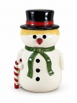WEISS, uma (1) biscoiteira no feitio de boneco de neve, confeccionado em faiança vitrificada na tonalidade branca com pintura em policromia, apresentando sinais de craquele, medindo 26x16x10,5cm.
