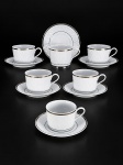 PORCELANA REAL - (6) Xícaras para chá com seus respectivos pires confeccionadas em porcelana branca vitrificada , corpo texturizado em relevo filetado à prata , medida : 6 x 8 cm