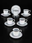 PORCELANA REAL - (6) Xícaras para café com seus respectivos pires confeccionadas em porcelana branca vitrificada , corpo texturizado em relevo filetado à prata , medida : 5,5 x 5 cm