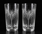 CRISTAL, dois (2) copos para água, possivelmente FRATELLI VITTA, confeccionado em cristal translucido, lapidado por coqueiros e frisos verticais em baixo relevo, medindo 12,5x6,5cm.