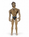 BRINQUEDO, uma (1) figura de ação MATTEL, da linha MAX STEEL, personagem Bio-Constrictor (Homem-Cobra), vilão da franquia, lançado originalmente em 2001. Confeccionado em plástico rígido, com corpo articulado em tons terrosos e textura orgânica, destacando-se pelo pescoço extensível em formato de mola e mãos alongadas em forma de garras, medindo 30cm de altura.