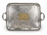 CHRISTOFLE, uma (1) grande bandeja para banquete confeccionada em metal francês espessurado a prata, borda em perolados, alças em caneluras e fitas cruzadas com arremates em laçarotes, fundo cinzelado por elementos florais, apresenta falhas na prateação, medindo 77x52cm.