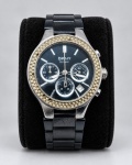 RELÓGIO, um (1) relógio da marca DKNY, modelo NY-4983, com caixa em aço inoxidável, pulseira em cerâmica preta, mostrador preto com três submostradores, calendário e marcadores aplicados, aro cravejado com cristais. Sinais de uso e ausência de pedrarias, funcionando, sem garantias futuras, caixa medindo 4cm.