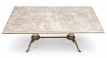 MOBILIÁRIO, uma (1) mesa de centro retangular, tampo em mármore, claro, estrutura em madeira torneada com patina branca e realces dourados, pés em bronze com rico cinzelado vegetalista com amarração central, apresenta falhas na patina, medindo 47x111x55cm.