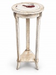 MOBILIÁRIO, uma (1) coluna confeccionada em madeira com patina branca, apresentando desgastes, entalhe floral com vestígios de douração, estágio inferior, sustentado por 3 pés retos, medindo 90,5x34,5cm.