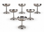 METAL PRATEADO, seis (6) taças para sobremesa confeccionadas em metal espessurado a prata da manufatura EBERLE, corpo e base cinzelada em caneluras, haste cilíndrica com frisos verticais, medindo 11x9,5cm.