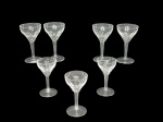 CRISTAL EUROPEU - Lote (7) Taças em cristal translúcido em fino corte facetado , sendo (A) - 4 para vinho , med : 12 cm  e (3) para licor , medida : 10 cm