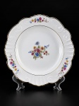 PORCELANA / VISTA ALEGRE - (1) Prato decorativo em porcelana banca vitrificada com decoração floral e borda filetada à ouro , medida : 23 cm