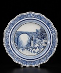 FAIANÇA - CAVALINHO (PORTO) -  (1) Prato/ medalhão em faiança vitrificada branca , com decoração monocromática em azul. Aba moldurada com ornamentos de inspiração vegetal e borda recortada , medida : 39 cm