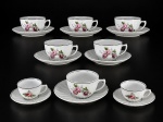 PORCELANA REAL (1943 a 1948), oito (8) xícaras com seus respectivos pires confeccionadas em porcelana na tonalidade branca, moldada em caneluras, com pintura de flores e folhagens em policromia com borda filetada em verde, sendo: A) 6 para chá, medindo 5,5x11x9cm e B) 2 para café, medindo 4x7,5x6,5cm.