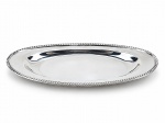 METAL PRATEADO, uma (1) travessa oval confeccionada em metal espessurado a prata da manufatura CRESCENT, borda em gomos torcidos, leves sinais de uso, medindo 35x16cm.