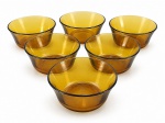 VIDROS, seis (6) bowls confeccionados em vidro na tonalidade âmbar da manufatura DURALEX, medindo 5x10,5cm.