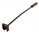 Antigo marcador em ferro fundido com cabo em madeira - 55x04x04 cm - com desgastes do uso.