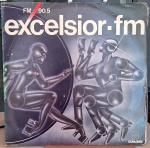 Excelsior FM. Selo : Som Livre  404-7122. Formato : Vinil , LP, Compilação. País : Brasil. Lançado : 1979.Capa boa. Disco muito  bom. Usado. Necessita limpeza.