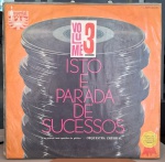 Isto É Parada De Sucessos - Volume 3. Selo : Imperial  IMP-30.055. Série : Isto É Parada De SucessosFormato : Vinil , LP, Álbum. País : Brasil. Capa sanduiche muito boa. Disco muito bom. Usado. Necessita limpeza.